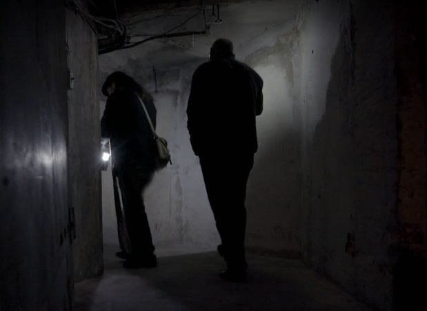 Chris Dowgin and Robert Irvine walking in tunnels in Salem